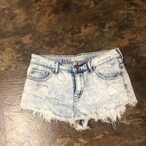 Acid wash distressed denim shorts